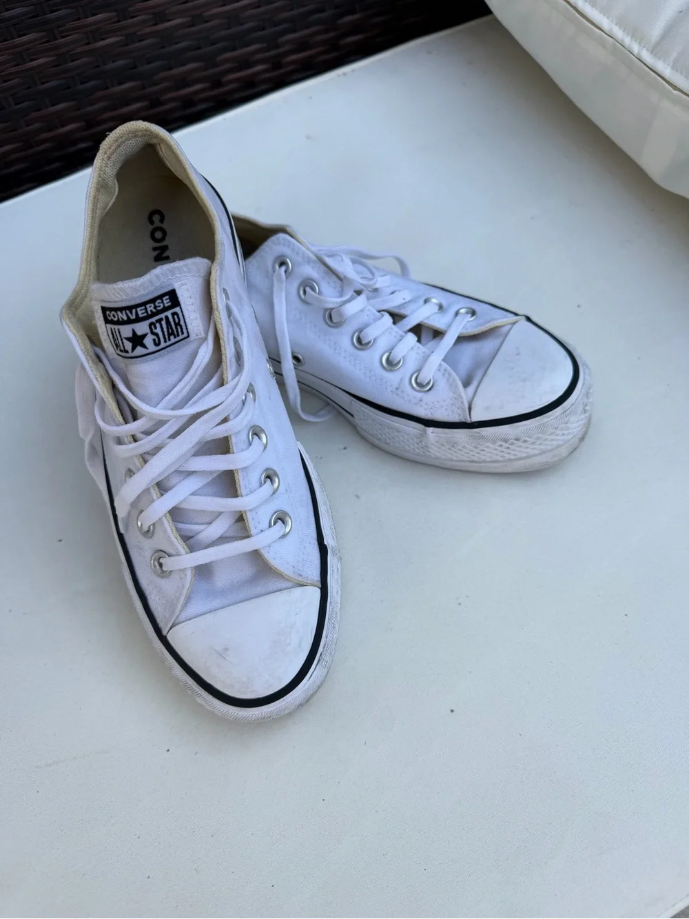 Converse women’s platform White Low Top Sneakers